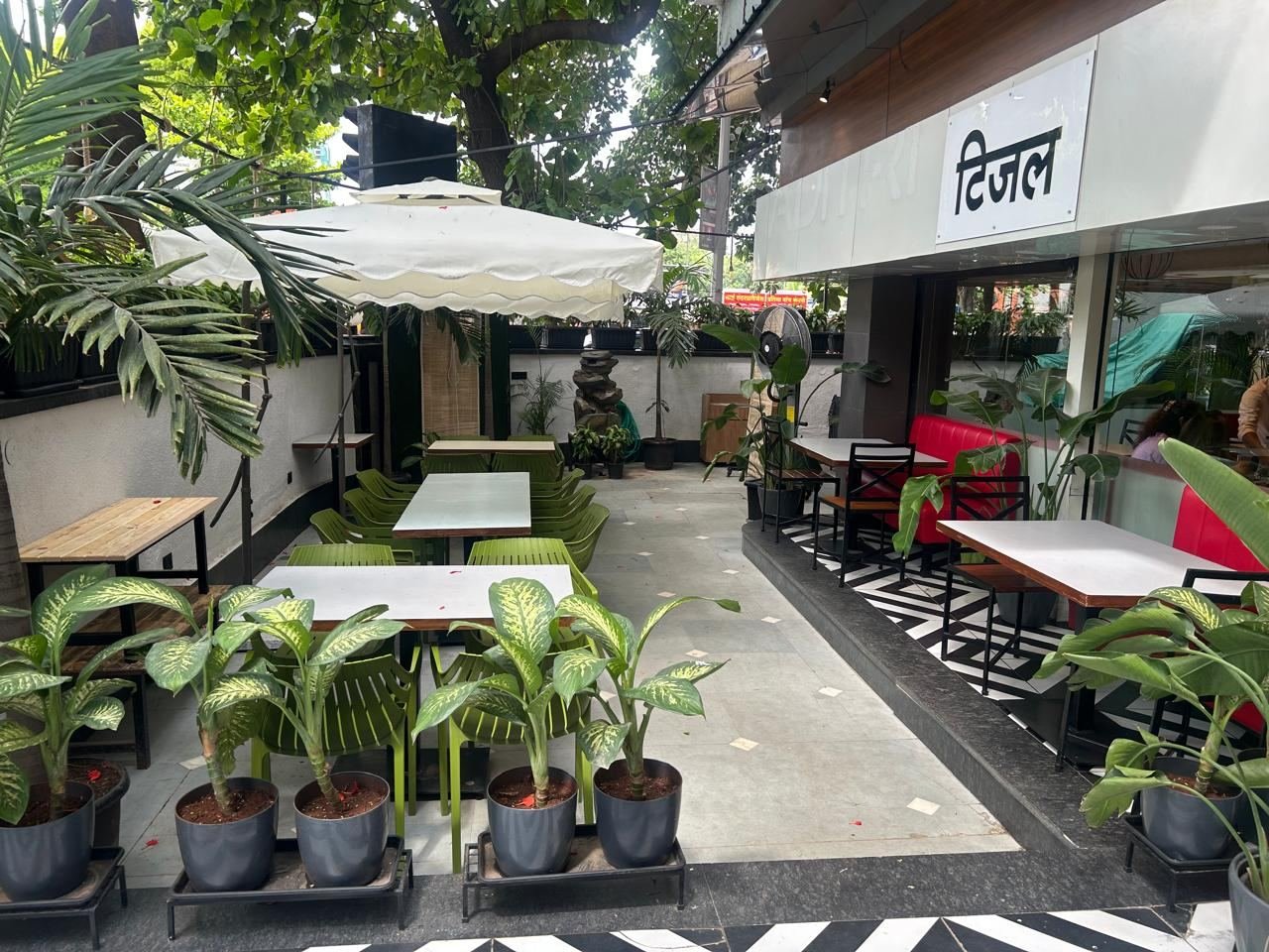 Leafy outdoor patio seating