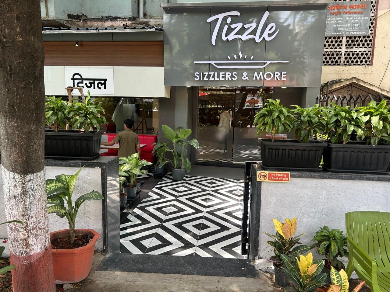 Tizzle storefront on Karve Road